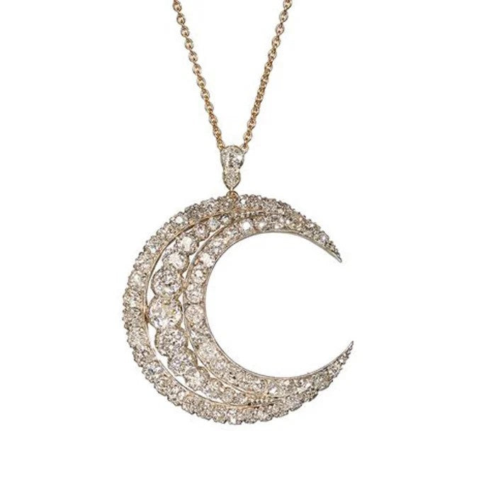 Victorian Antique Old Cut Diamond Crescent Moon Pendant, set with graduating rows of old-cut diamonds in silver-upon-gold, Circa 1890