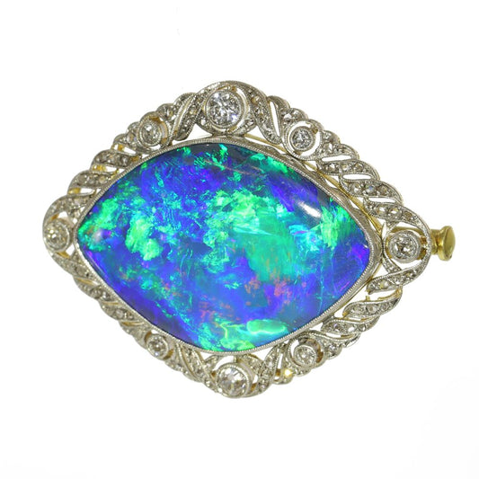 Antique 24 ct Black Opal Brooch Surrounded by Diamonds Set In 18ct Gold