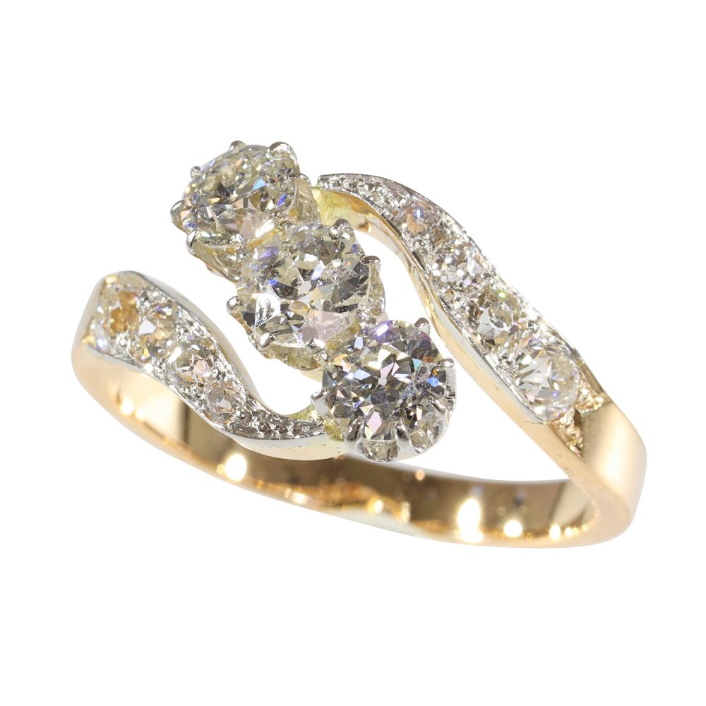 Antique diamond engagement ring in gold and platinum.