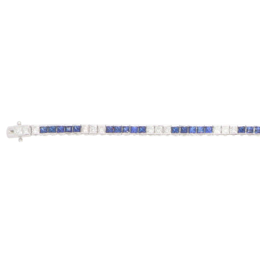 Sapphire and diamond tennis bracelet in white gold.