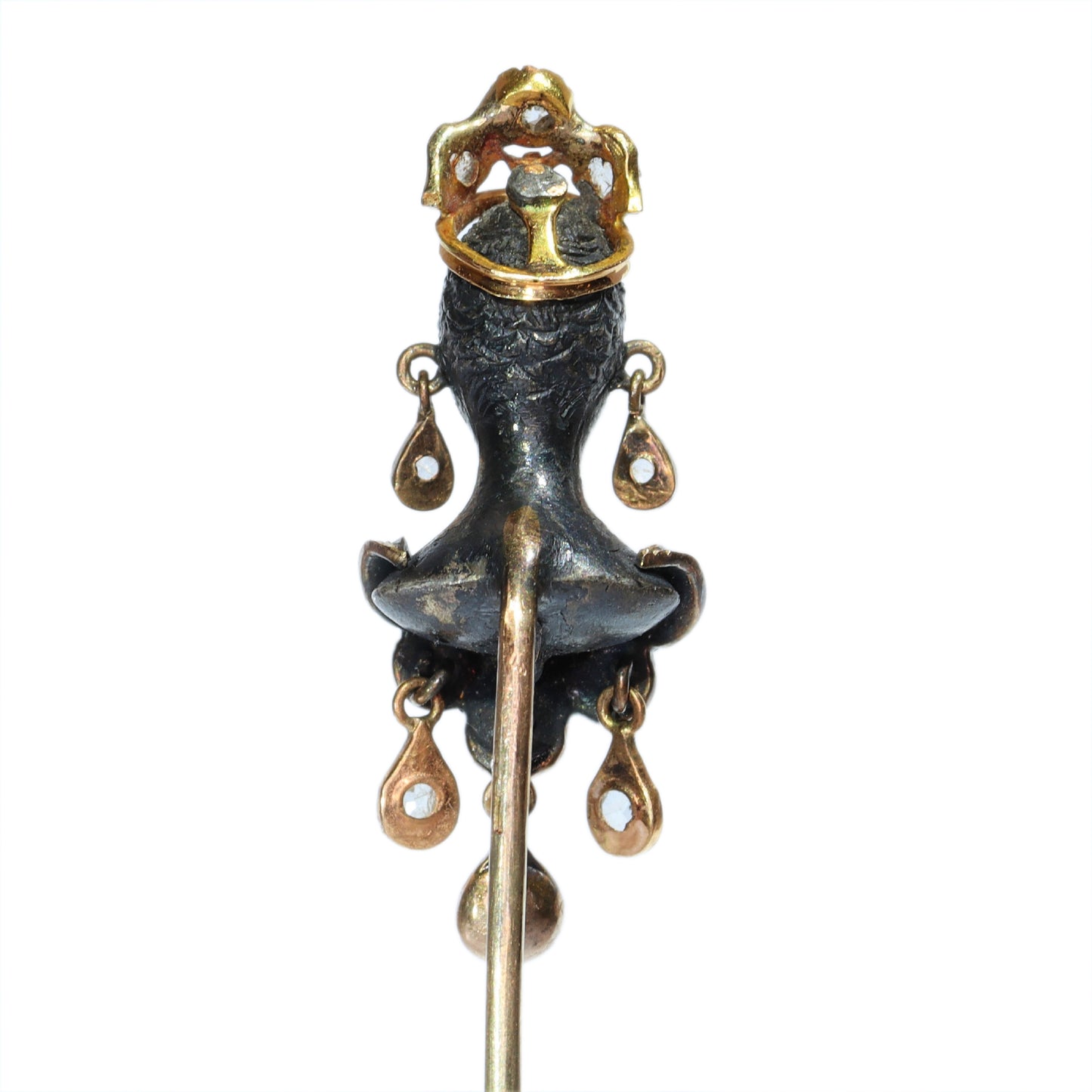 An antique blackamoor head stickpin in gold and silver with rose cut diamond adornments