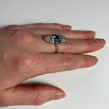 Vintage French Sapphire, Diamond and Platinum Cocktail Ring; set with 1.25cts sapphires and 0.80cts old European-cut diamonds, maker’s mark for Jean Jorens