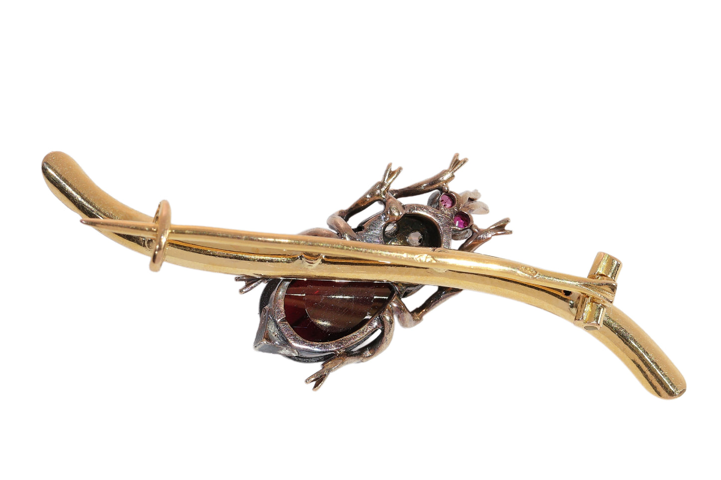 A garnet, ruby and diamond beetle brooch in gold and silver