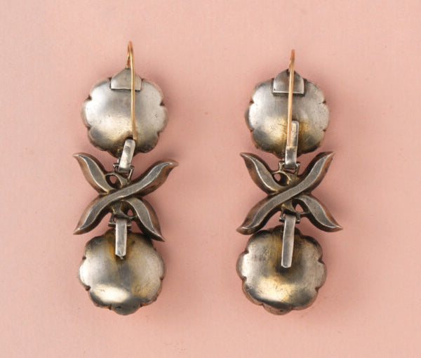 18th Century Imperial Topaz Cluster Drop Earrings, set in silver and backed with foil, decorated with flowers and bows, gold hooks. Portugal, circa 1750.