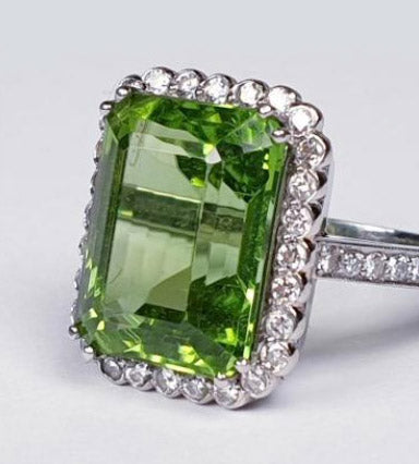 8.9ct Emerald Cut Peridot and Diamond Cluster Ring in Platinum