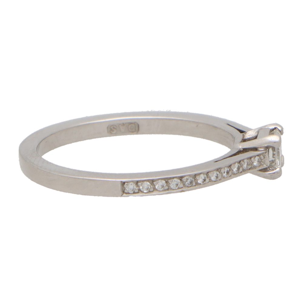 Emerald Cut Diamond Ring With Diamond Shoulders