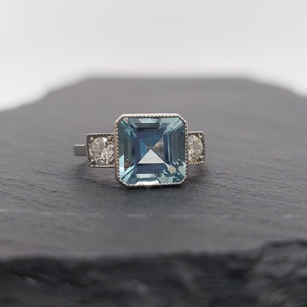 3ct Octagonal Cut Aquamarine and Diamond Three Stone Ring