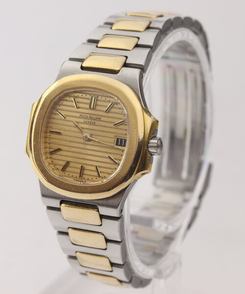 Patek Philippe Ladies 4700 Nautilus 27mm Steel and Gold Quartz Watch, golden champagne face, date aperture at 3, Steel and gold bracelet