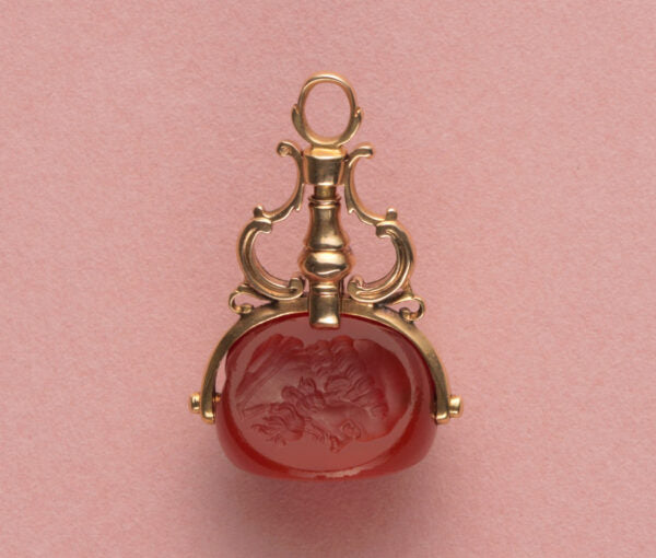 18th Century Carnelian Intaglio and 18ct Gold Triple Seal; with three intaglios: two feature profiles, one features an angel, two doves and text from Don Juan quote by Molière