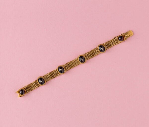 Antique Victorian 18ct Gold Neo Etruscan Bracelet with Garnets and Diamonds; delicately woven links set with cabochon cut garnets and rose cut diamonds. Circa 1870