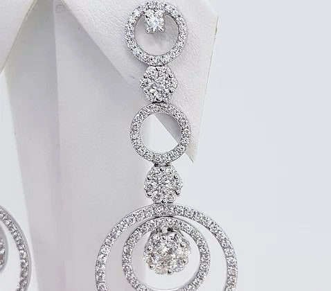 Contemporary 3ct Diamond Circular Drop Earrings, comprising of diamond set circles and clusters, 3.00 carat total, in 18ct white gold.