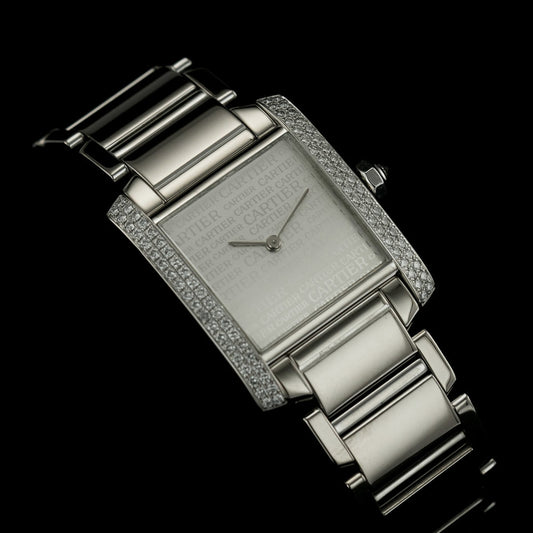 Cartier Tank Francaise 18ct White Gold WE101853 Factory Diamond Watch with factory set diamond case and limited production silver Cartier Boutique dial in original red Cartier box, with instruction booklet and stamped Cartier warranty papers dated 2010