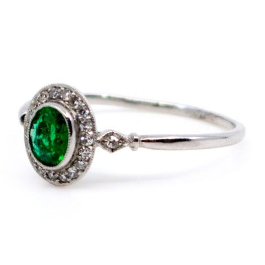 Vintage Platinum Emerald and Diamond Oval Cluster Ring, 0.35 Carat