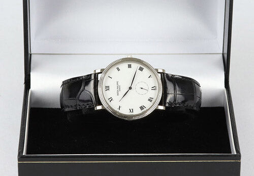 Patek Philippe 3919 Calatrava 18ct White Gold Gents 33mm Manual Watch, white dial, black Roman hour markers and small seconds, Patek Philippe black leather strap with 18ct white gold pin buckle, with Patek Philippe extract