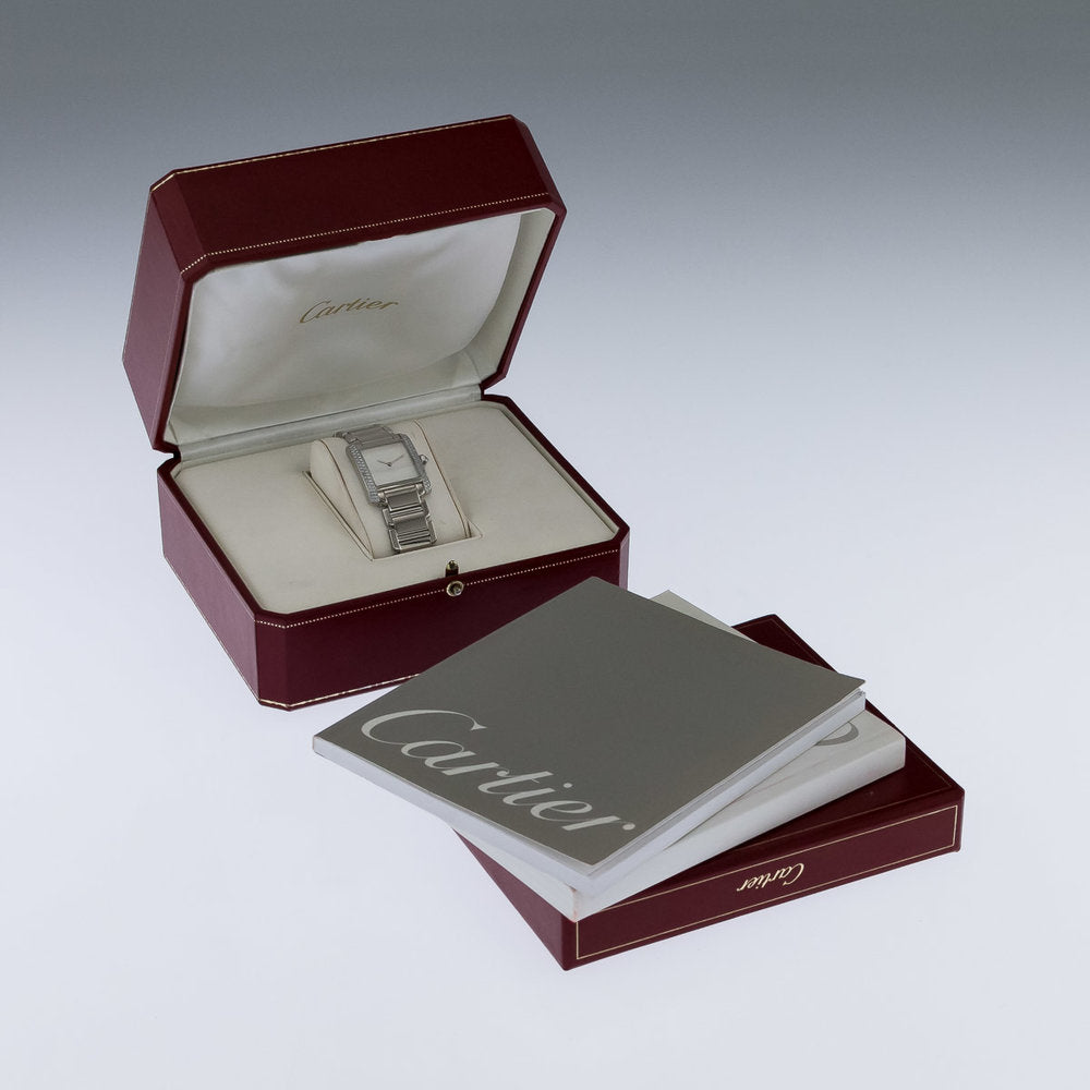 Cartier Tank Francaise 18ct White Gold WE101853 Factory Diamond Watch with factory set diamond case and limited production silver Cartier Boutique dial in original red Cartier box, with instruction booklet and stamped Cartier warranty papers dated 2010