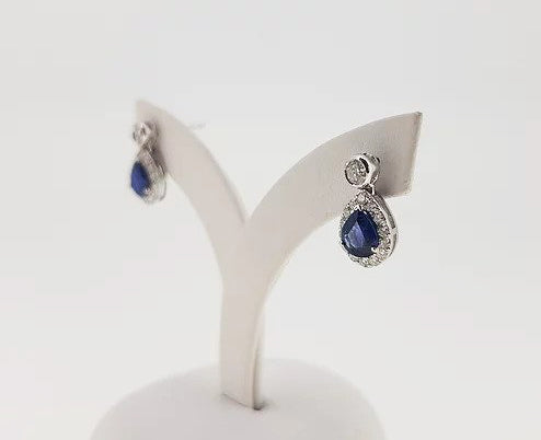 Sapphire and Diamond Pear Shaped Cluster Drop Earrings; 1.23cts sapphires surrounded by diamonds, suspended from diamond stud, 18ct white gold