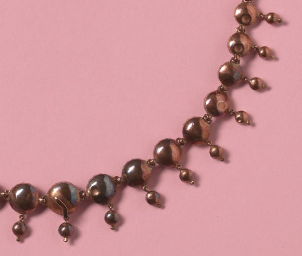 Antique Victorian Graduated Perpignan Garnet Fringe Necklace; set with rose-cut rhodolite garnets, foil backed, garnet set clasp