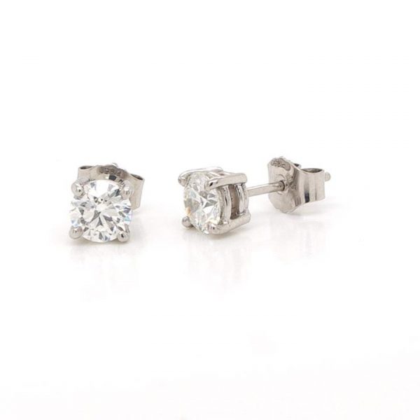 Diamond and Platinum Single Stone Stud Earrings; round brilliant-cut diamond solitaire stud earrings, 0.70ct each, certified