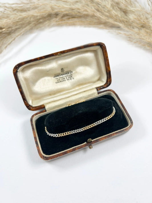 Antique 18 Carat Gold and Platinum Curb Link Bracelet with Swivel Clasp, Circa 1920