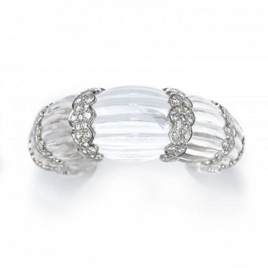 Rock Crystal and Diamond Cuff Bangle Bracelet; modern fluted rock crystal bangle bracelet carved from one single piece of rock crystal, with eight scalloped 18ct white gold sections set with 7.00 carats round brilliant-cut diamonds