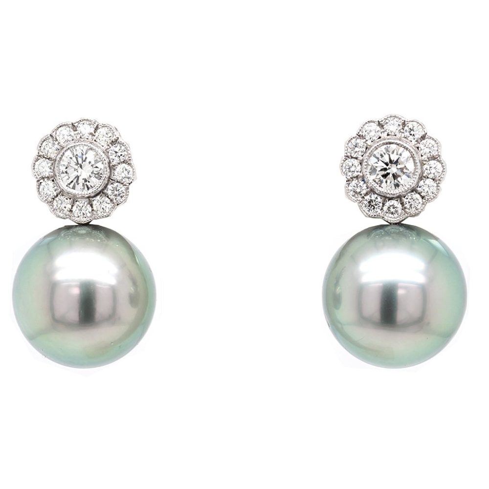 Tahitian Pearl and Diamond Drop Earrings A beautiful pair of 13.9mm Tahitian pearl earrings sitting below a diamond flower design cluster stud