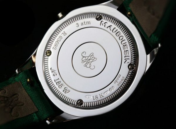 Mauboussin Ladies 18ct Gold and Diamond 26mm Quartz Watch, 18ct gold case, 1.00ct diamond bezel, on a green Mauboussin fabric strap.