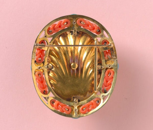 18th Century Carved Coral Cameo Brooch of Bacchante, a follower of Bacchus, framed by carved coral knots, rose-cut diamond ribbons and carved coral flowers