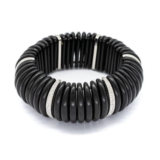 Ebony Diamond and Platinum Expandable Cuff Bracelet; ebony segments spaced by graduated diamond links pavé set in platinum, 2.75 carat total
