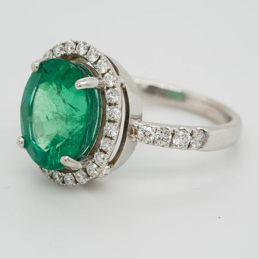 5ct Oval Emerald and Diamond Halo Cluster Engagement Ring