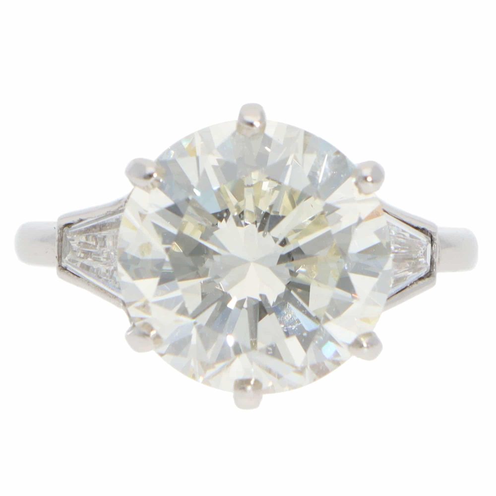 Vintage 6.03 Carat GIA Certified Diamond Three Stone Ring In Platinum