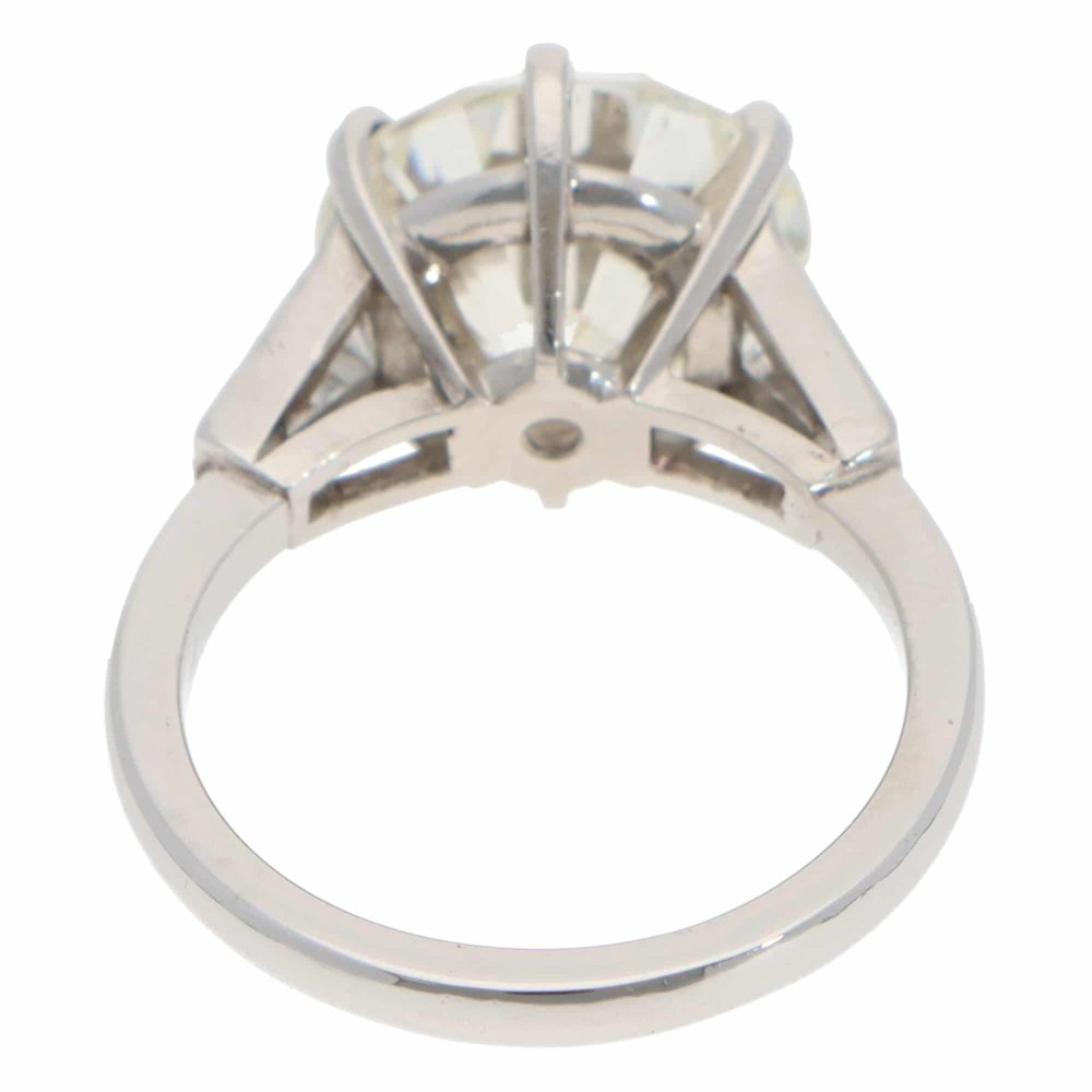 Vintage 6.03 Carat GIA Certified Diamond Three Stone Ring In Platinum