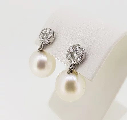 South Sea Pearl and Diamond Cluster Drop Earrings; 13.5mm South Sea pearls suspended from 0.80cts circular diamond clusters, 18ct white gold