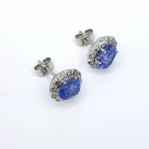 Sapphire and Diamond Oval Cluster Earrings; 2.00cts oval faceted sapphires, surrounded by brilliant-cut diamonds, in 18ct white gold