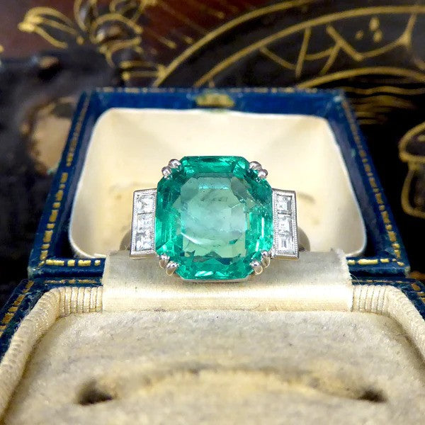 Certified 6.19ct Octagonal Cut Colombian Emerald and Princess Cut Diamond Ring in Platinum with GCS certificate