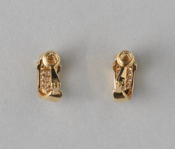 Contemporary 1.36ct Diamond set 18ct Yellow Gold Buckle Clip Earrings, 1.36 carat total, Master mark: DM for David Morris, England, 1990