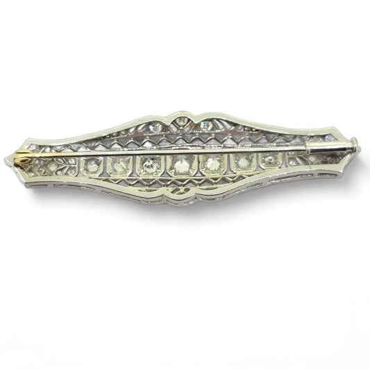 Edwardian Antique 2.5ct Diamond Bar Brooch, central line of old cut diamonds set in decorative pierced surround accented with further smaller diamonds
