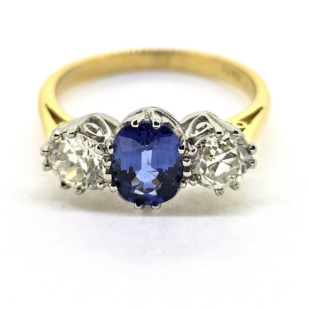 1.20ct Oval Sapphire and Diamond Three Stone Engagement Ring