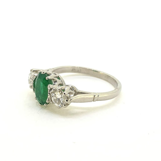 1.30ct Oval Emerald and Diamond Three Stone Engagement Ring in Platinum