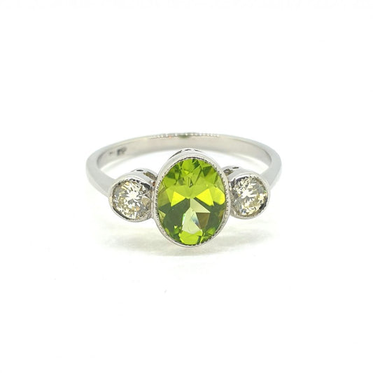 1.25ct Oval Peridot and Diamond Three Stone Ring