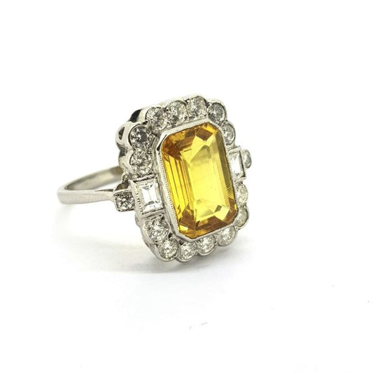 4ct Emerald Cut Yellow Sapphire and Diamond Cluster Ring in Platinum