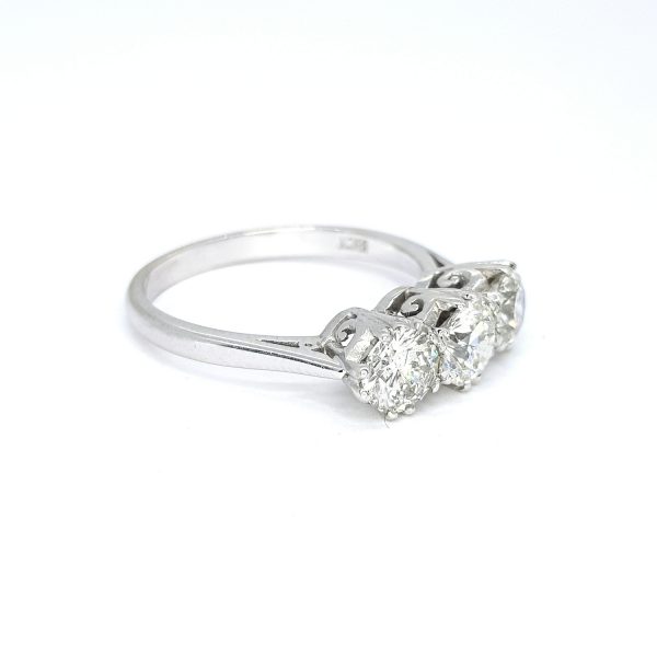 Traditional Diamond Three Stone Ring; 1.60 carat total, featuring three round brilliant-cut diamonds, all claw set and mounted in 18ct white gold