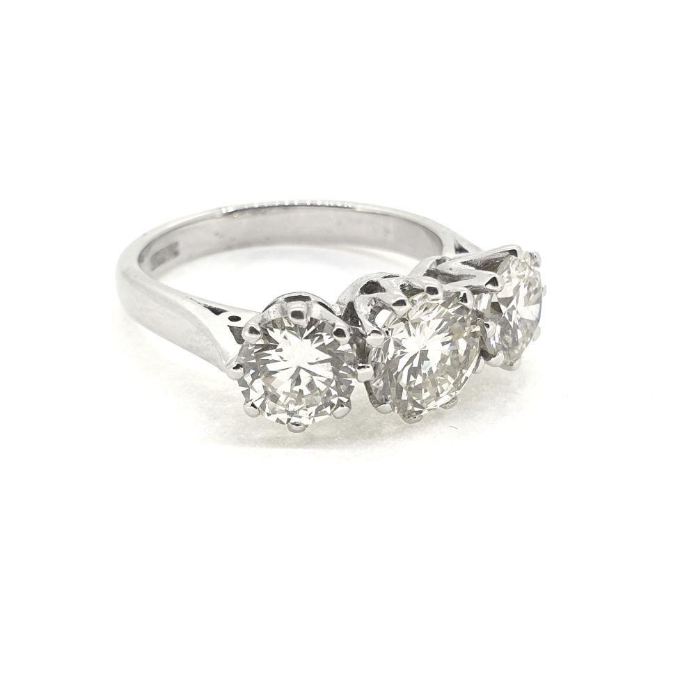 Vintage Diamond Three Stone Engagement Ring, 3 carat total, claw set with three round brilliant-cut diamonds in 18ct white gold. Circa 1994