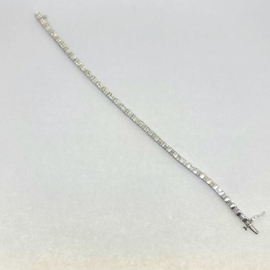 Vintage 4.50ct Baguette Cut Diamond Line Tennis Bracelet, 37 links each set with two baguette-cut diamonds in 18ct White Gold
