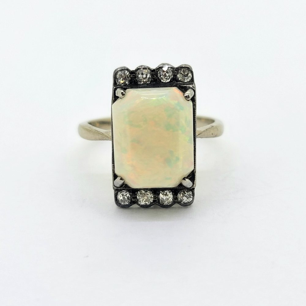Art Deco Opal and Old Cut Diamond Plaque Tablet Ring, central cabochon opal edged with a top and bottom row of old-cut diamonds