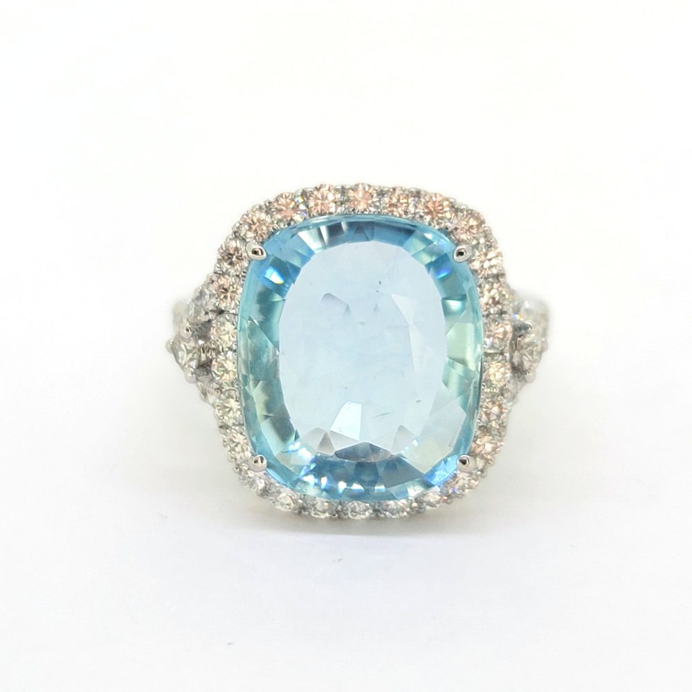 8ct Cushion Cut Aquamarine and Diamond Cluster Cocktail Dress Ring, large 8.08ct cushion-shaped aquamarine within halo of diamonds in 18ct white gold with tapered triangular diamond-set shoulders