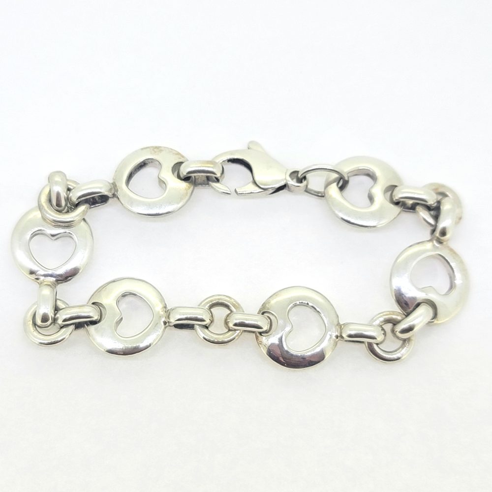 Rare Vintage Tiffany and Co Stencil Heart Silver Bracelet, open heart 925 silver bracelet composed of stencil heart links by Tiffany & Co