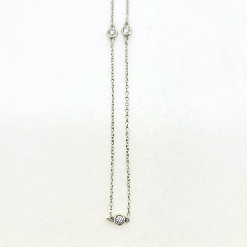 Vintage Tiffany and Co Diamonds by the Yard Silver Chain Necklace, 925 silver trace chain is interspersed with bezel set round brilliant cut diamonds