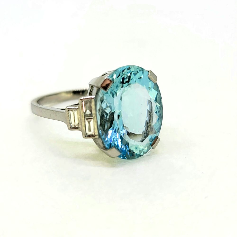 7ct Oval Aquamarine Solitaire Ring with Baguette Diamond Shoulders in Platinum