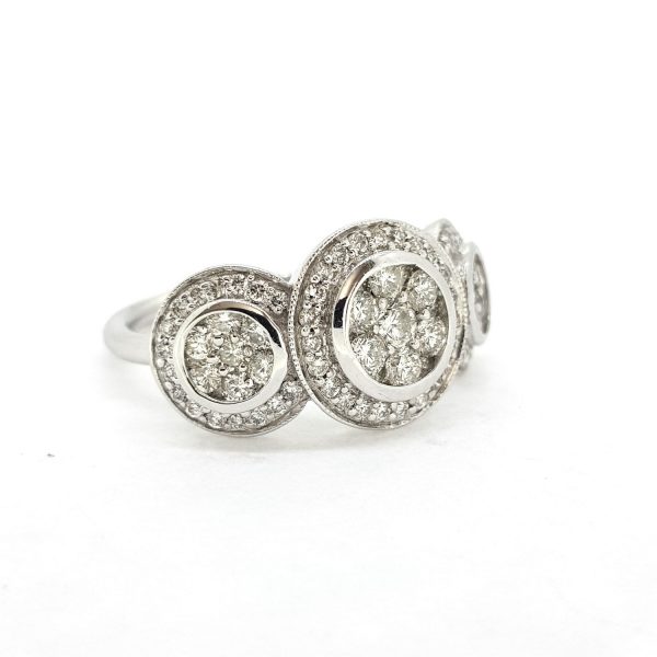 Diamond Triple Cluster Ring, 1.50 carat total, featuring three diamond clusters, each with a diamond-set surround, in 18ct white gold