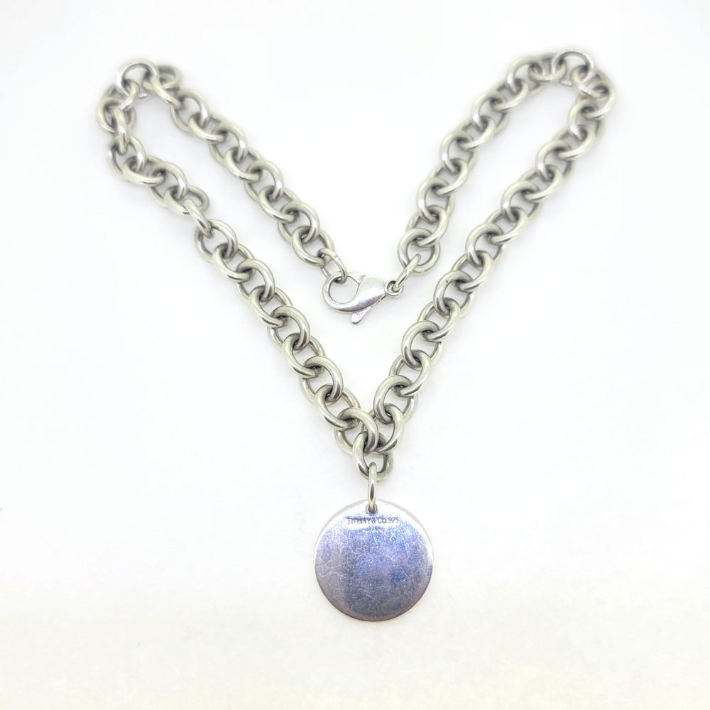 Vintage Tiffany and Co Silver Tag Chain Necklace, Return to... collection necklace with iconic blank circular tag charm. Hallmarked 2004